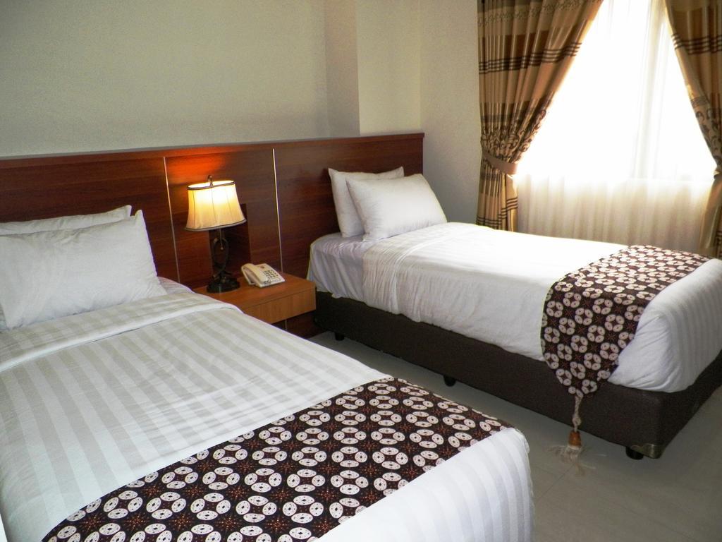 Maranatha Grand Hotel Yogyakarta Szoba fotó